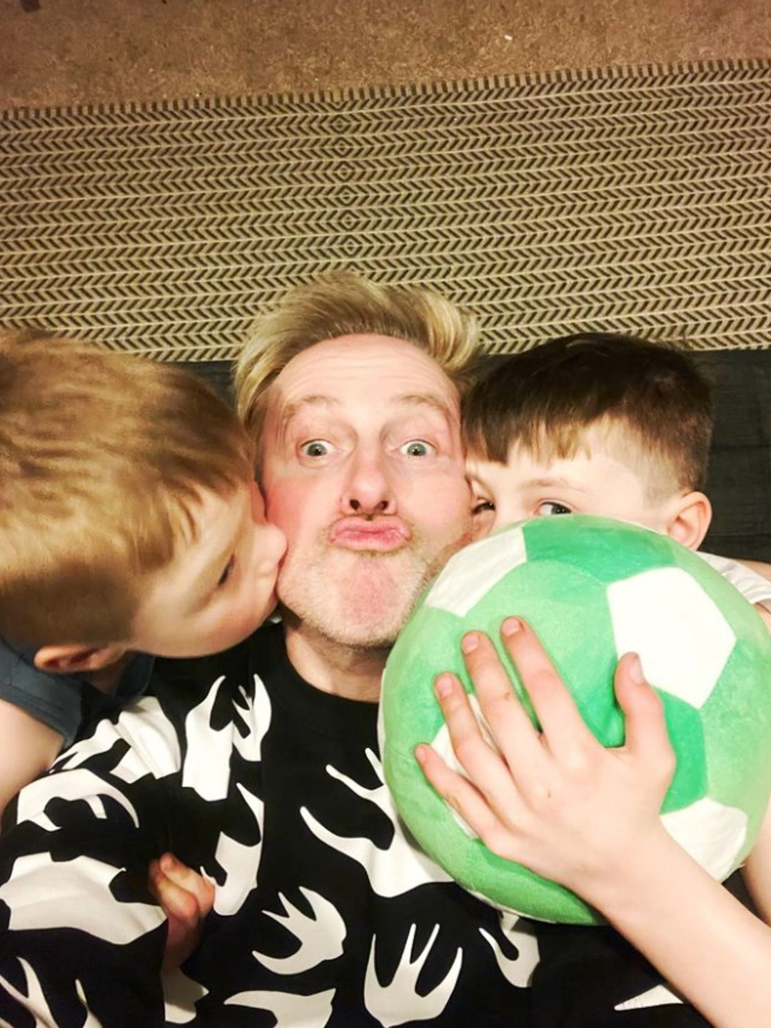 Ian 'H' Watkins with his sons