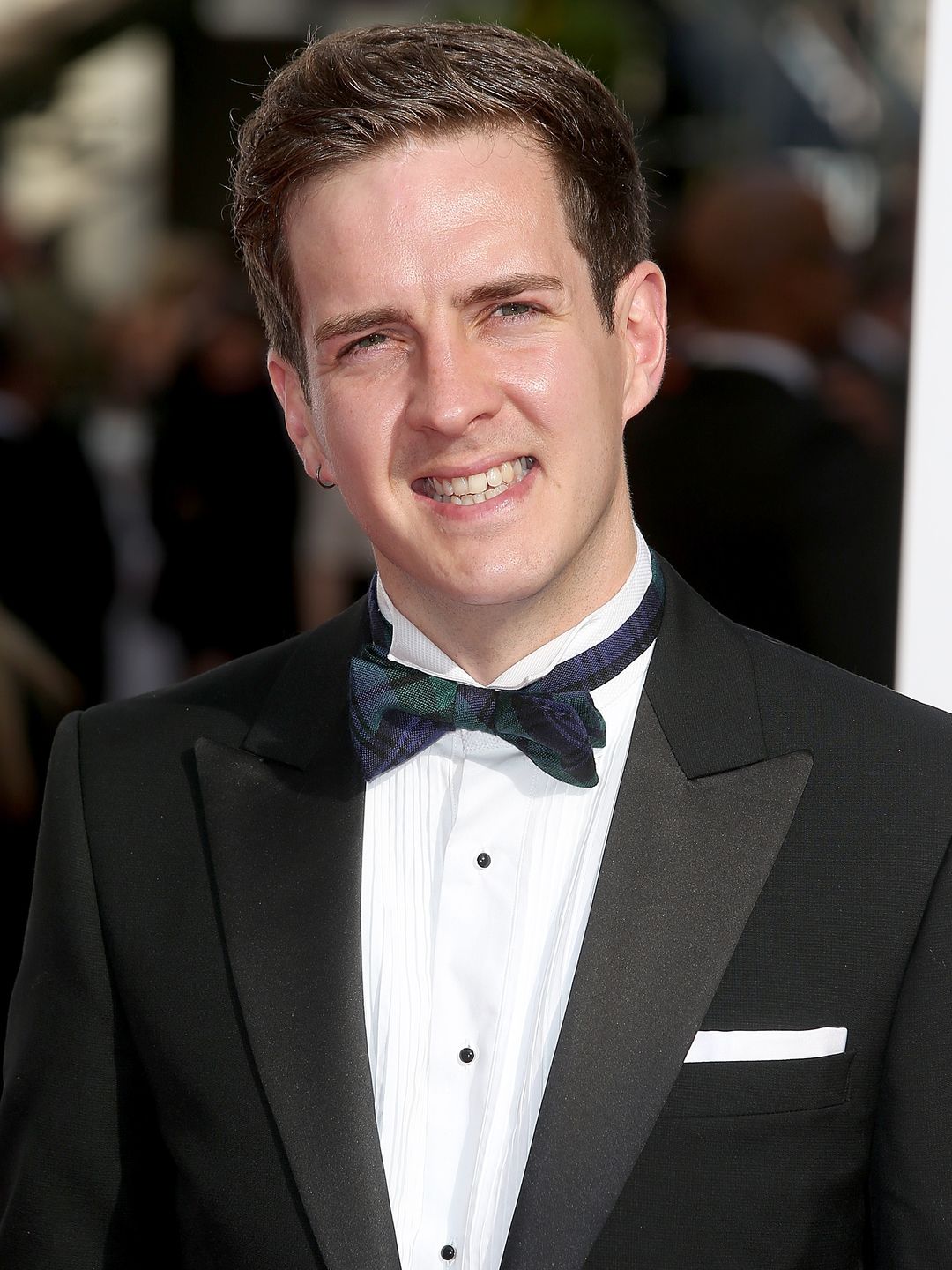 Stevie McCrorie in a black tuxedo