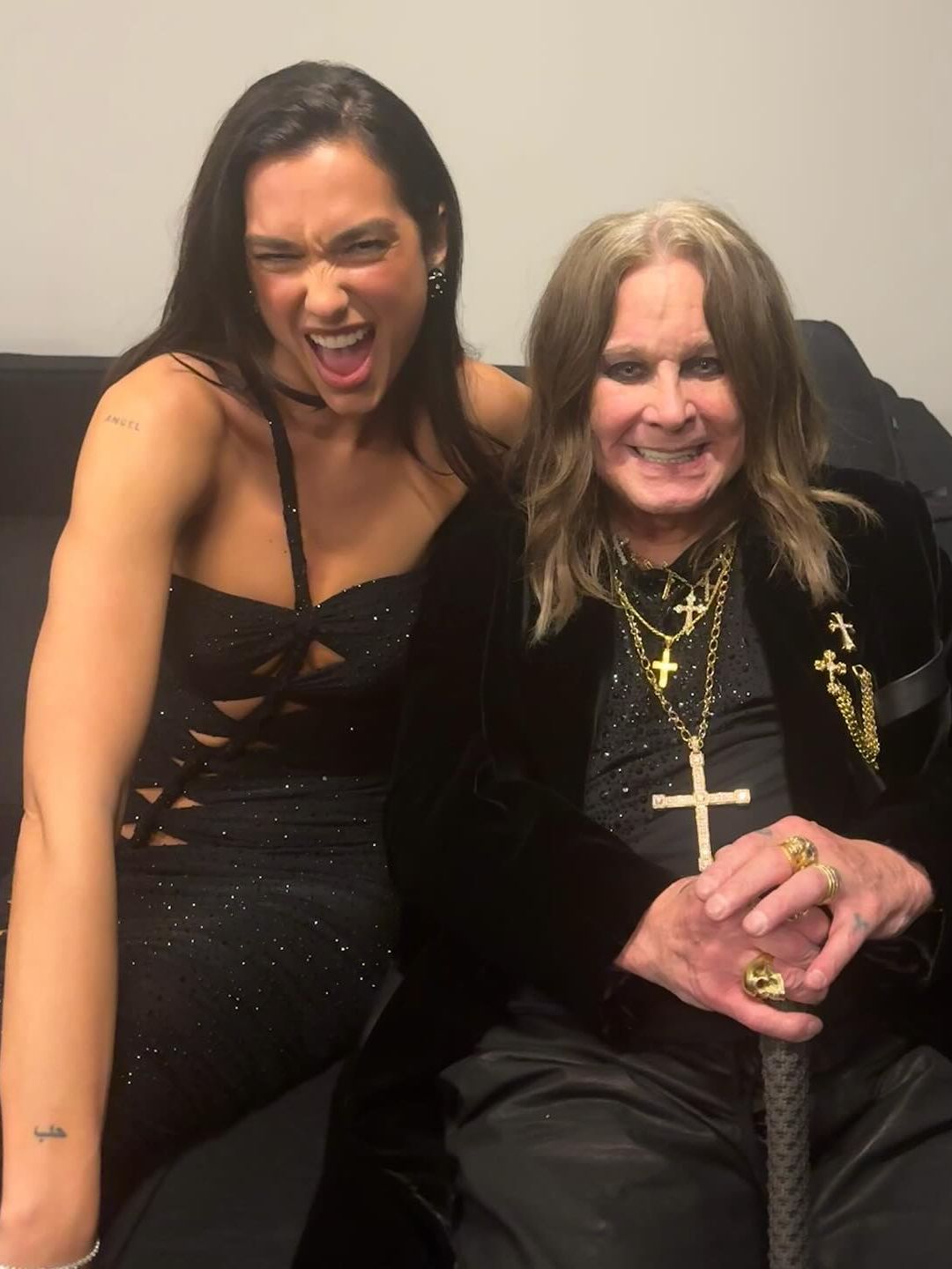 Dua Lipa and Ozzy Osbourne pose for a photo together