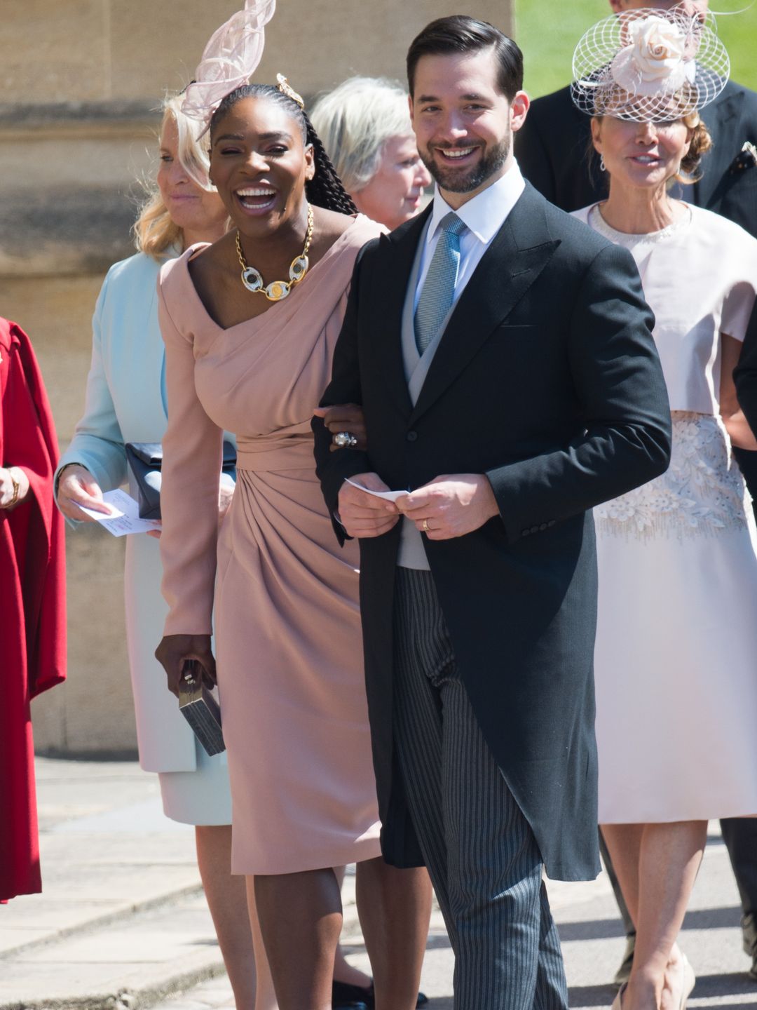 Serena and her husband Alexis smiling as they walk into Windsor for the wedding of Prince Harry and Meghan Markle