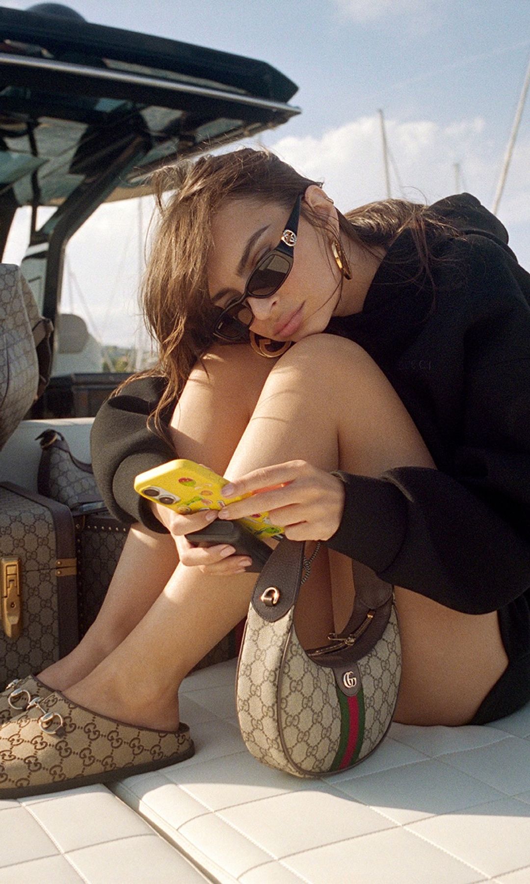 Emily Ratajkowski poses for Gucci
