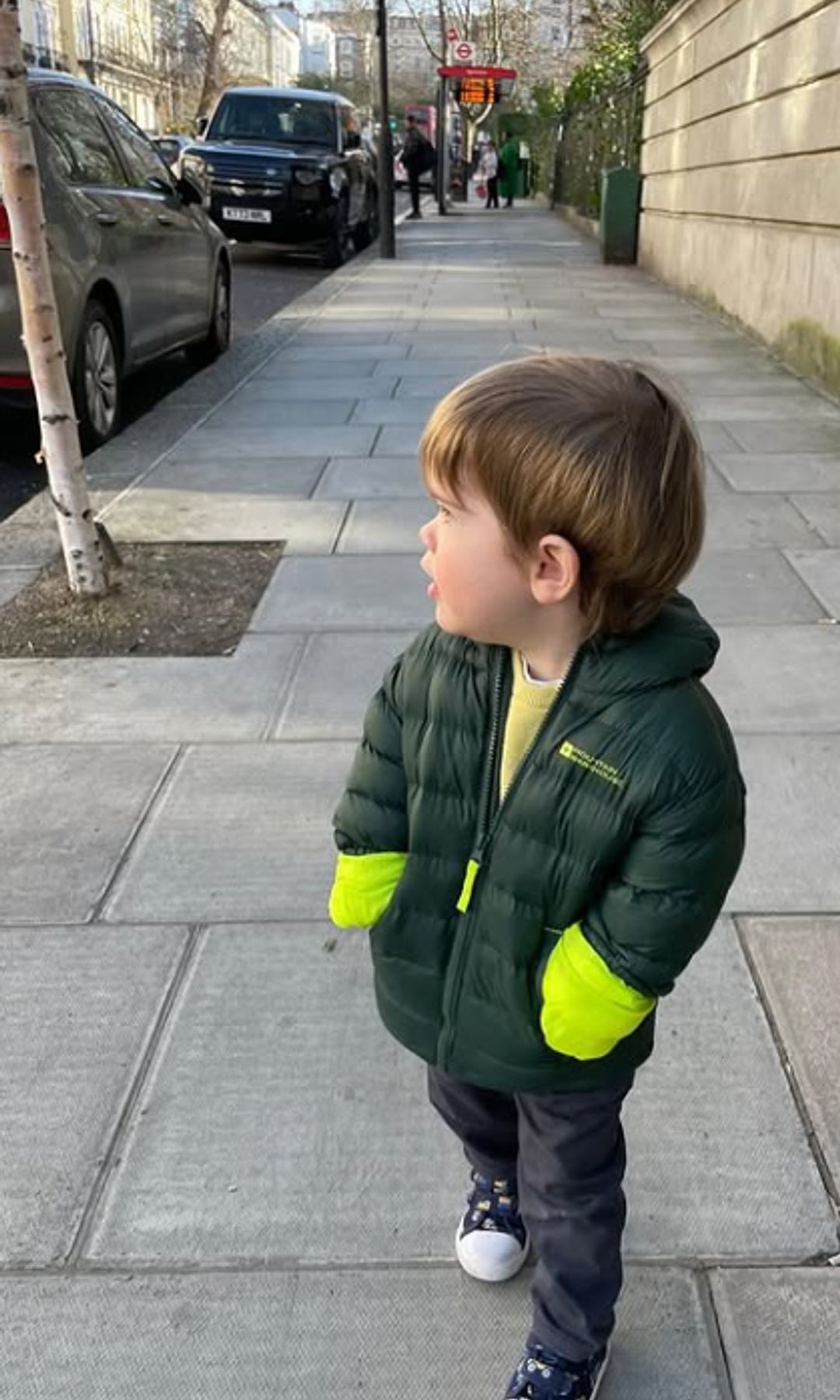Ernest Brooksbank looking curious on a street