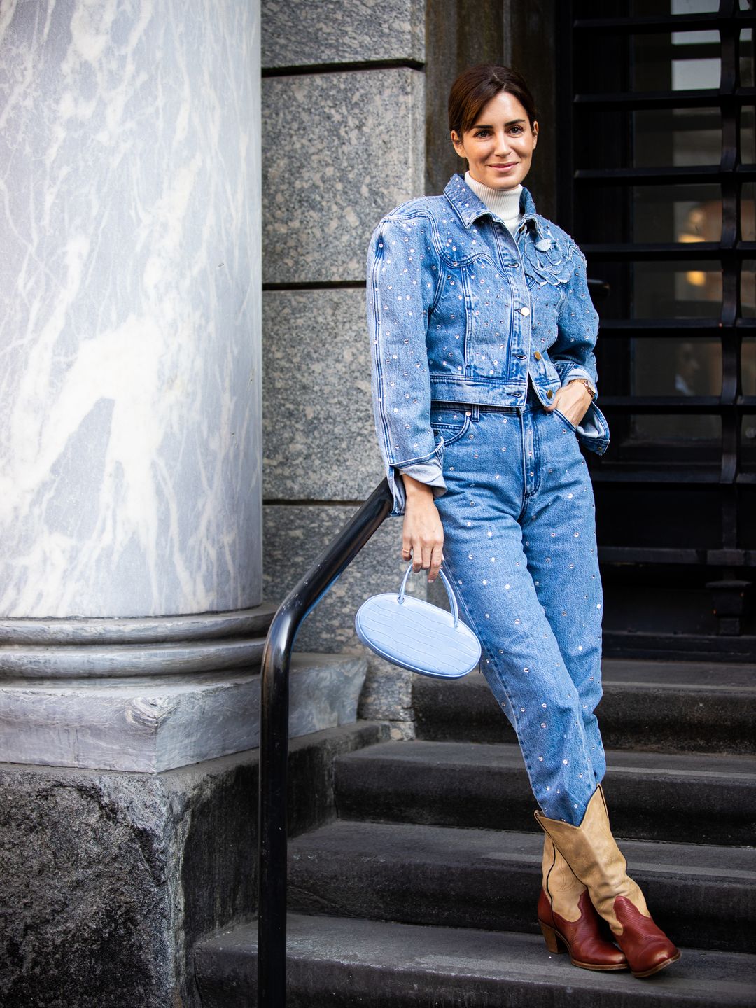 Gala Gonzalez rocks her pair with a studded denim jacket and matching jeans 