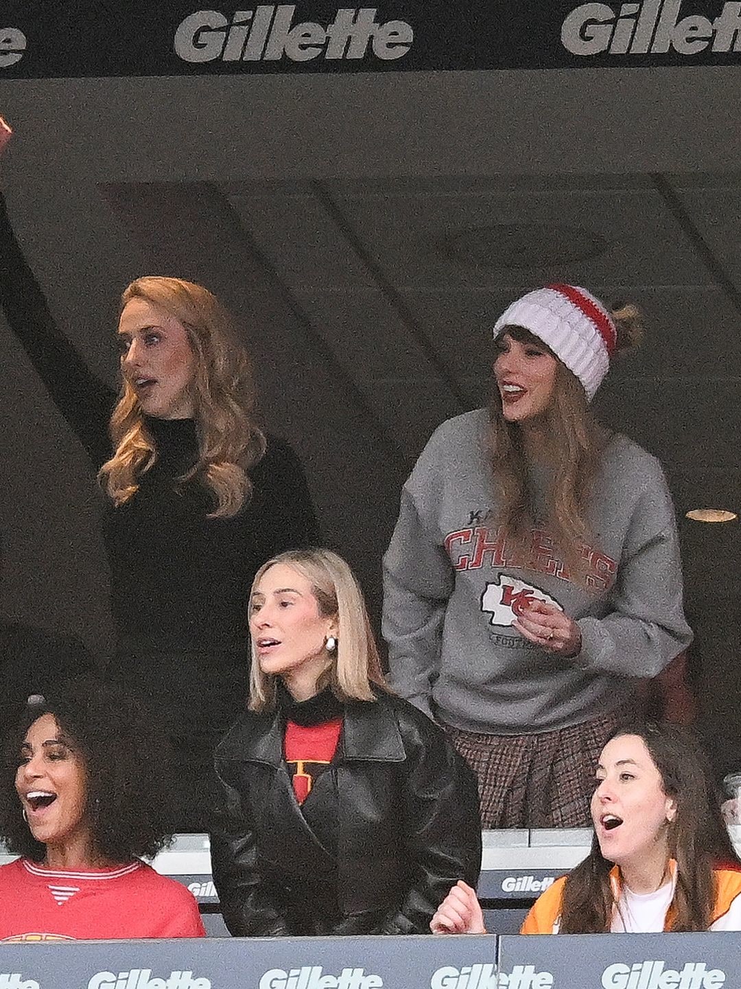 Brittany Mahomes and Taylor Swift cheer while watching the Kansas City Chiefs play the New England Patriots 