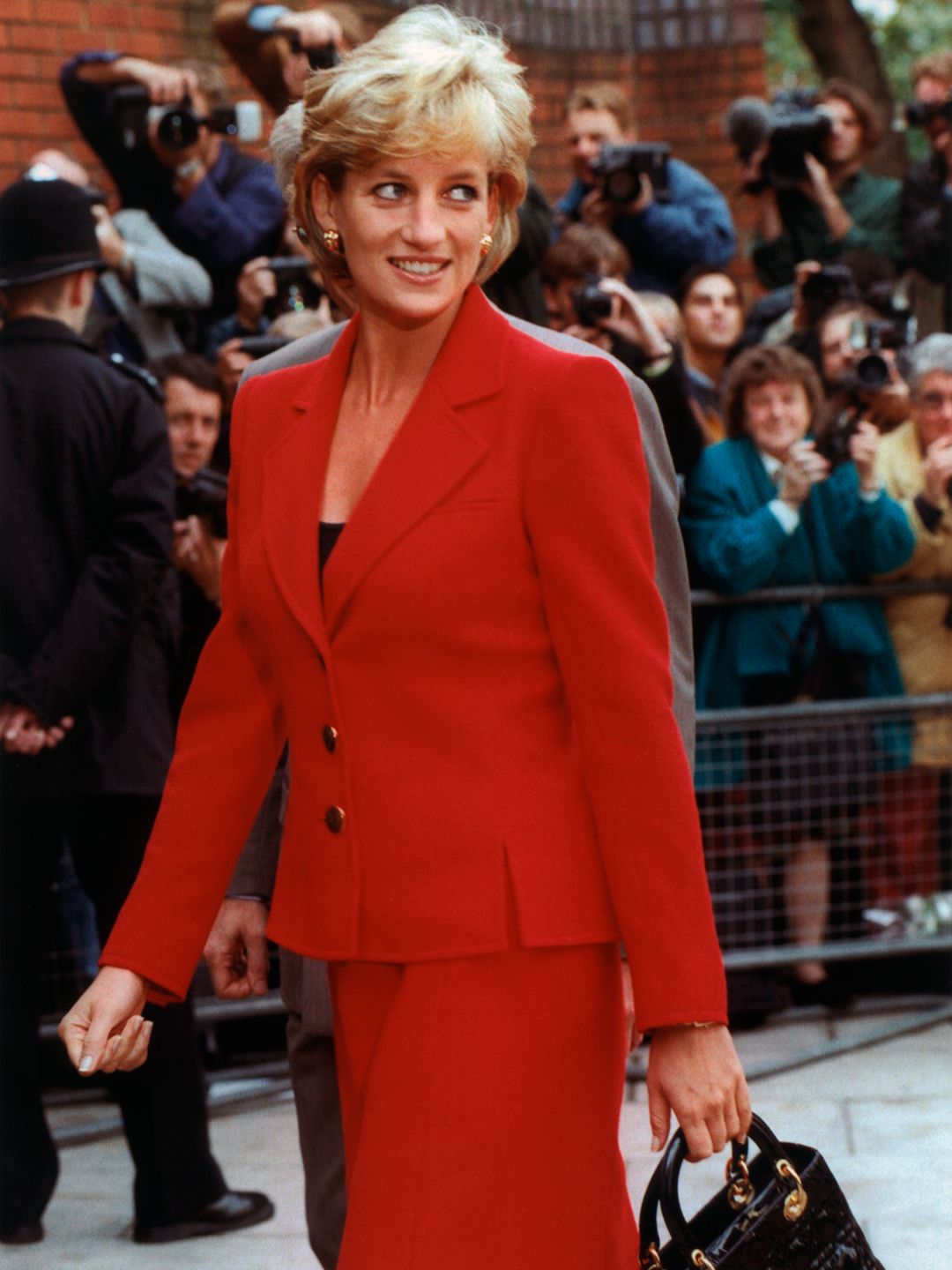 Princess Diana wearing red in London