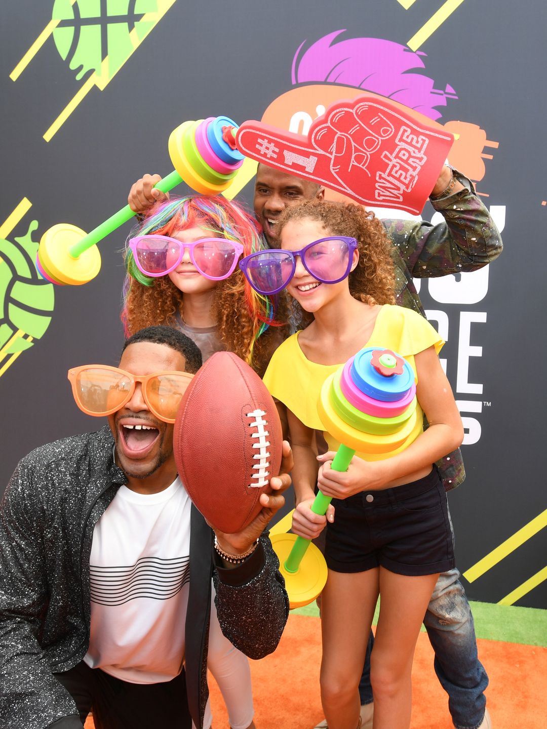 Michael Strahan with daughters Isabella and Sophia on the red carpet 