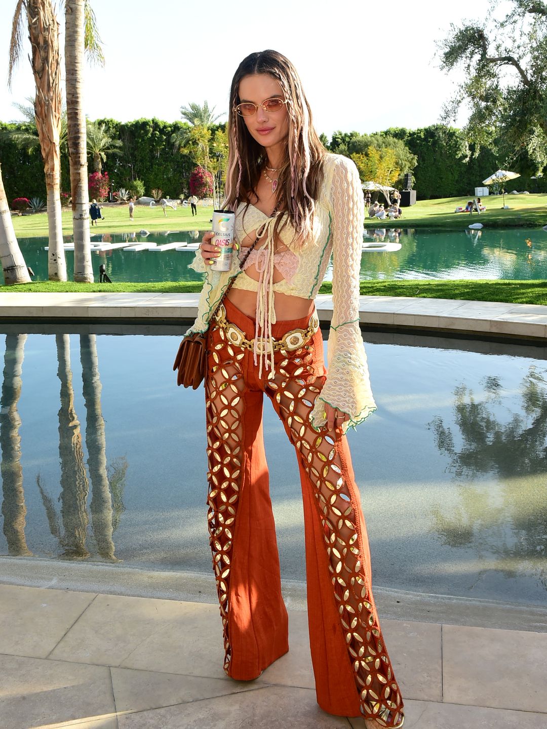 COACHELLA, CALIFORNIA - APRIL 14: Alessandra Ambrosio attends the CELSIUS Oasis Vibe House on April 14, 2023 in Coachella, California. (Photo by Vivien Killilea/Getty Images for CELSIUS)