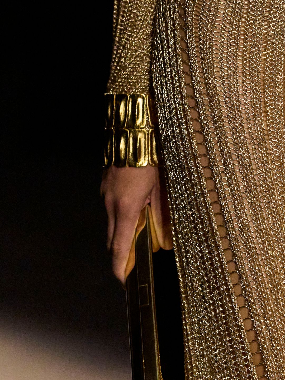 Close-up of gold cuff 