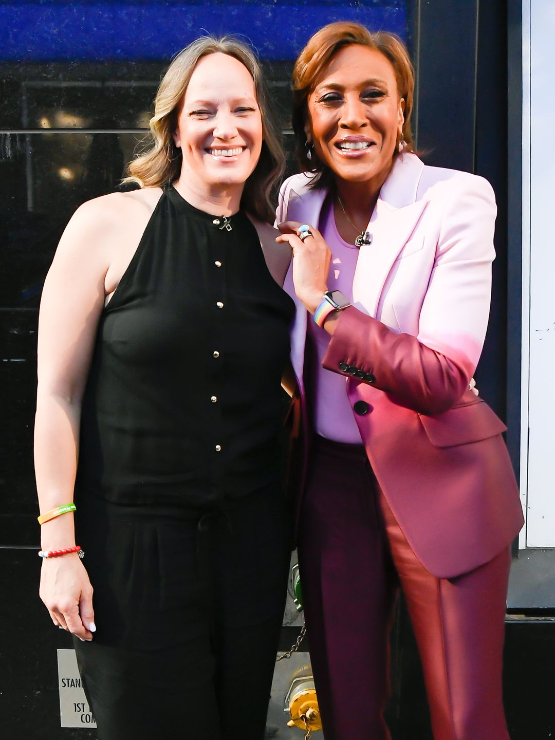 Robin and Amber smiling together at the GMA studios in 2022