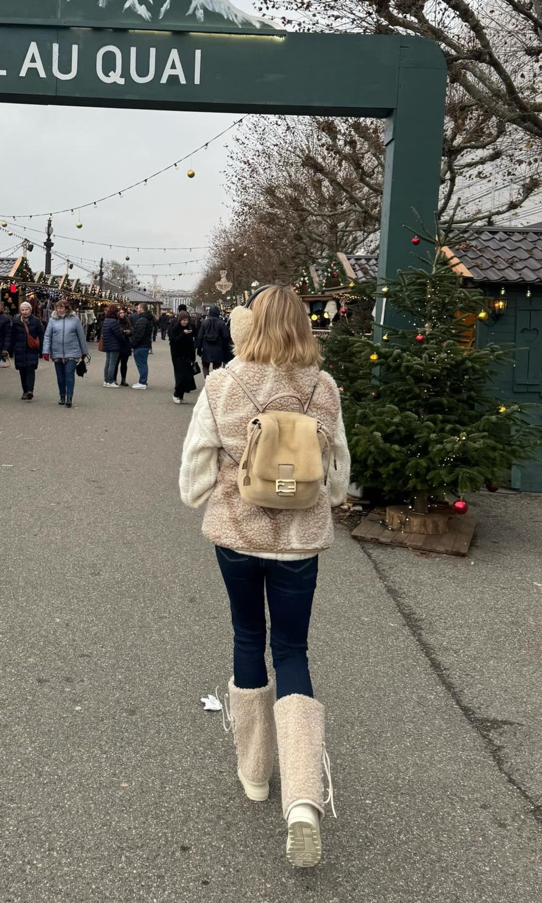 She wore the look to explore the festive markets 