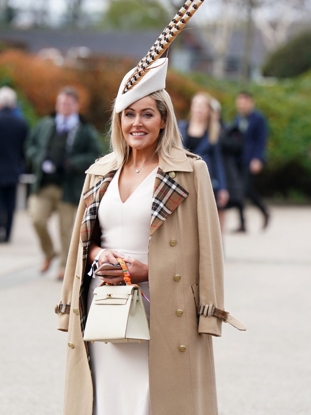 A racegoer arriving on day one of the 2024 Cheltenham Festival at Cheltenham Racecourse. Picture date: Tuesday March 12, 2024. (Photo by Mike Egerton/PA Images via Getty Images)