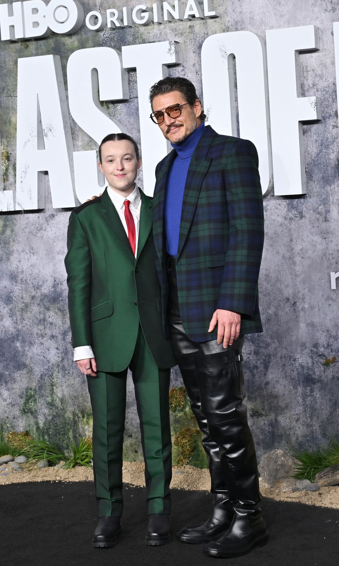 Bella Ramsey and Pedro Pascal pose at a press event for The Last Of Us 