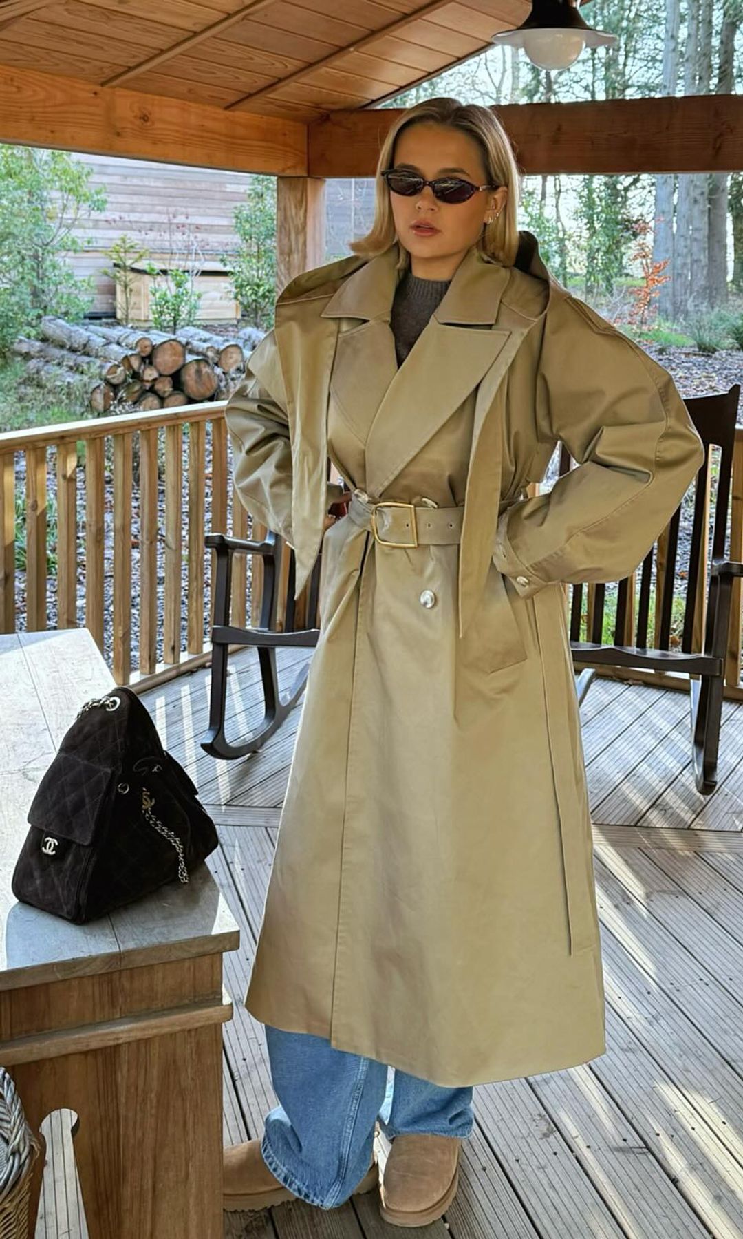 Molly-Mae Hague wears a trench coat and jeans to explore nature