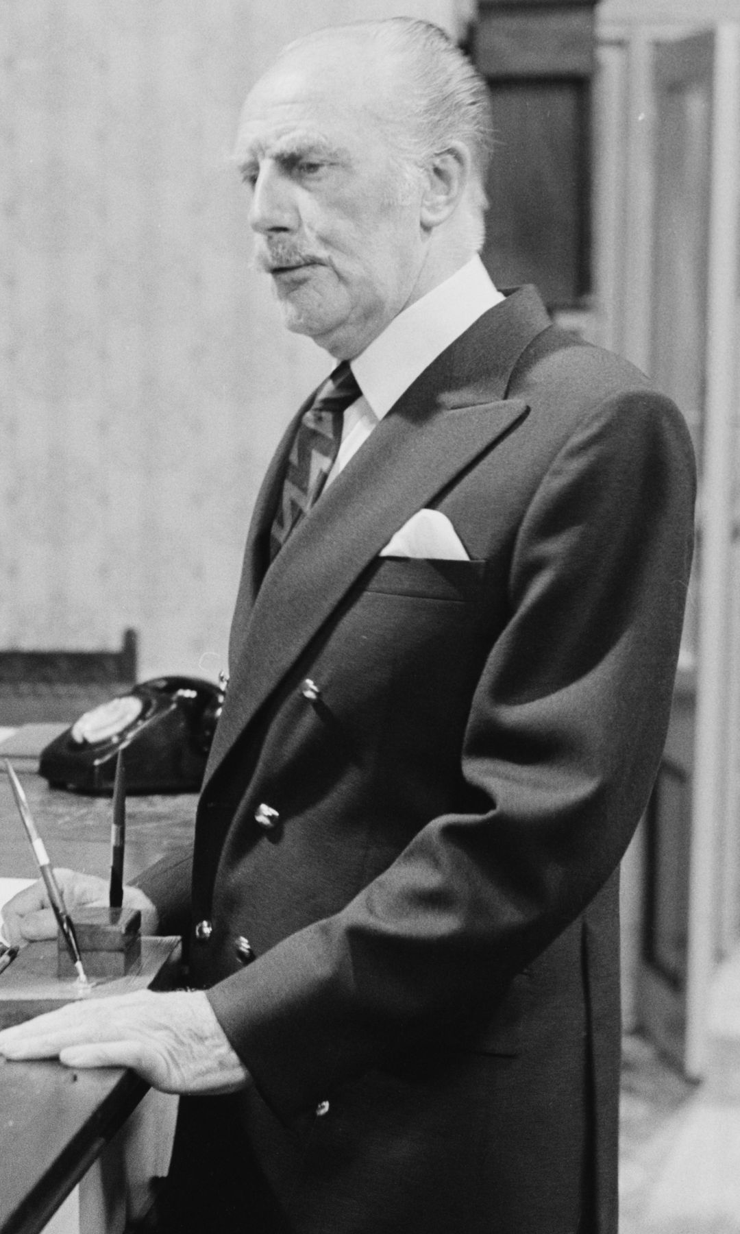 Black-and-white image of John Cleese and Ballard Berkeley in Fawlty Towers