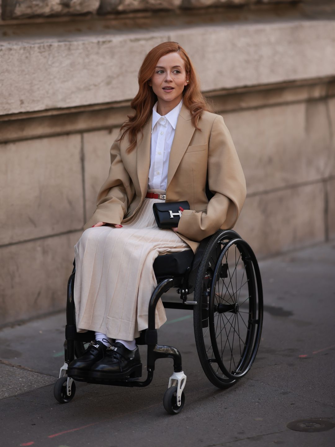 model in a wheelchair in blazer