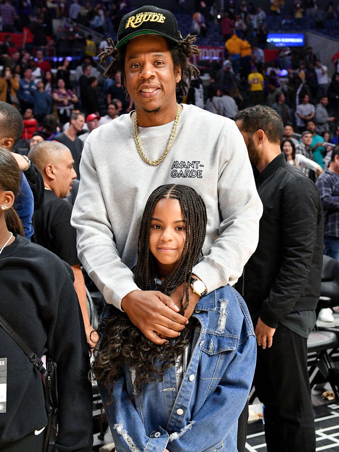 Jay-Z and Blue Ivy Carter attend a basketball game between the Los Angeles Clippers and the Los Angeles Lakers at Staples Center on March 08, 2020 in Los Angeles, California