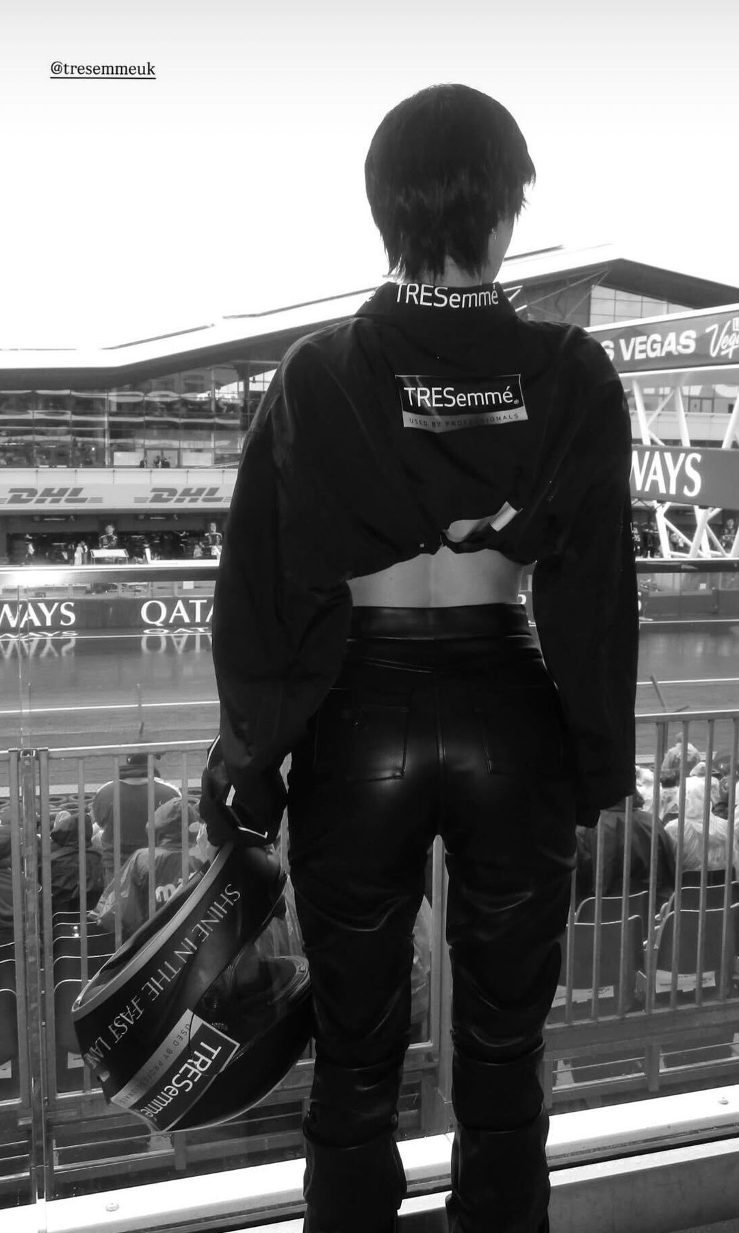 Maura higgings at silverstone with her back to the camera