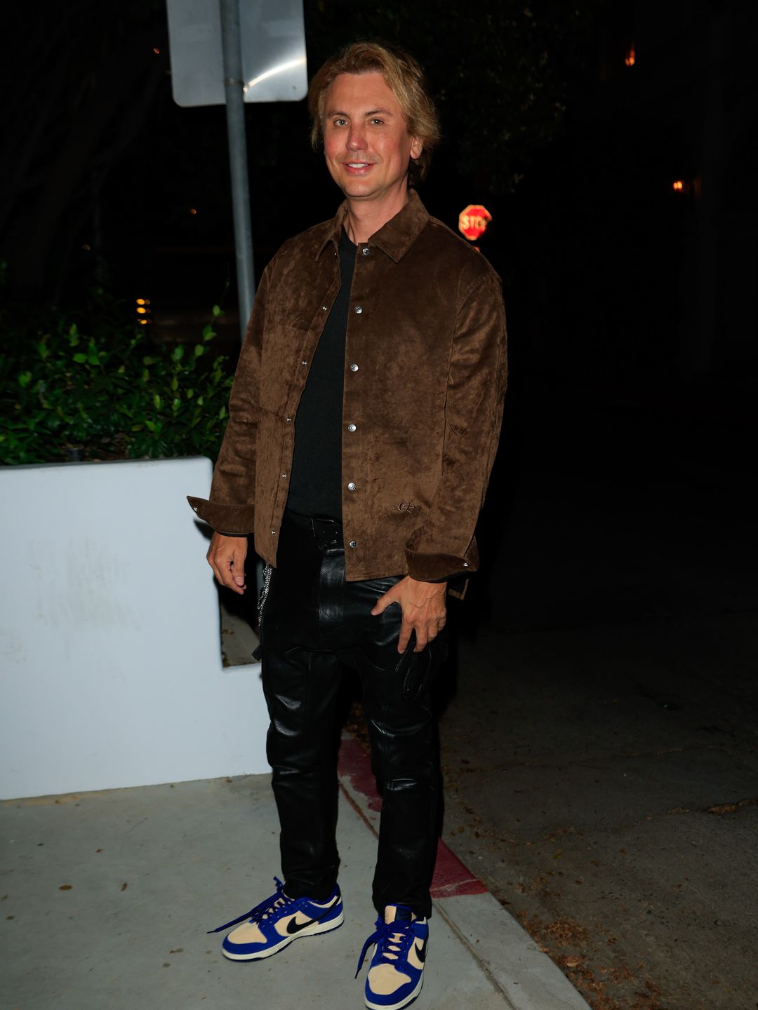 Jonathan Cheban opted for a brown boxy jacket and leather-look trousers