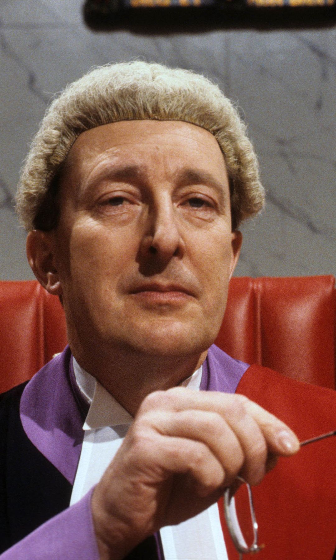 Peter Cellier as a judge in the show Crown Court