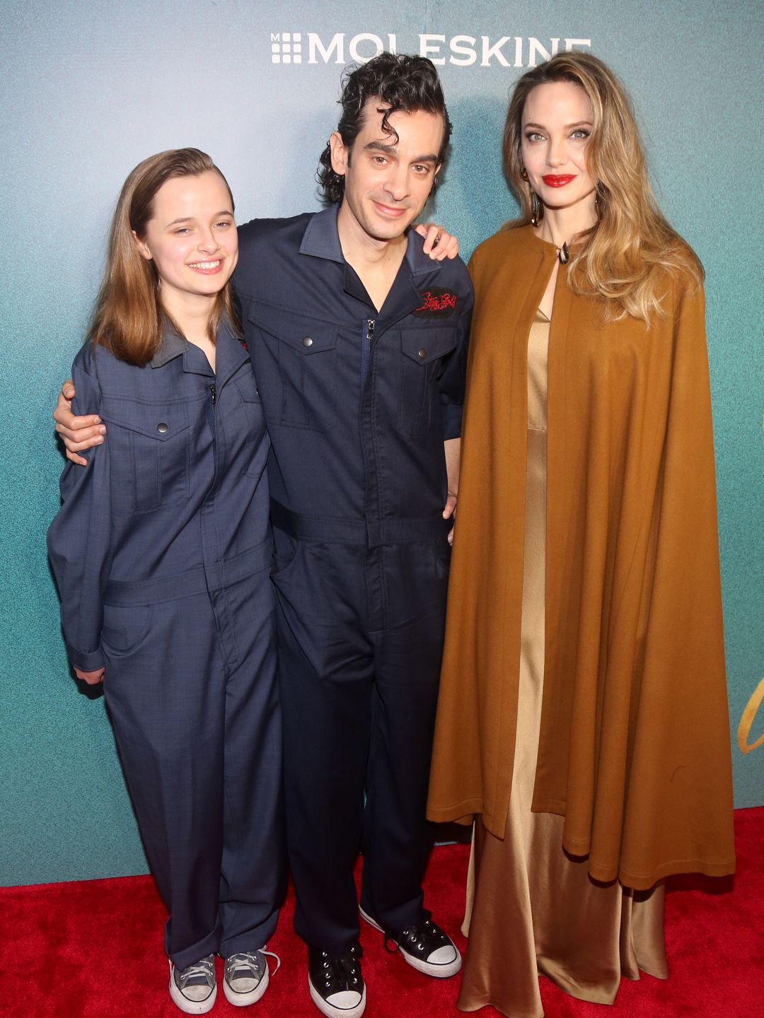 Vivienne Jolie-Pitt, Justin Levine and Angelina Jolie attend the opening night of "The Outsiders" at The Bernard B. Jacobs Theatre on April 11, 2024 in New York City.