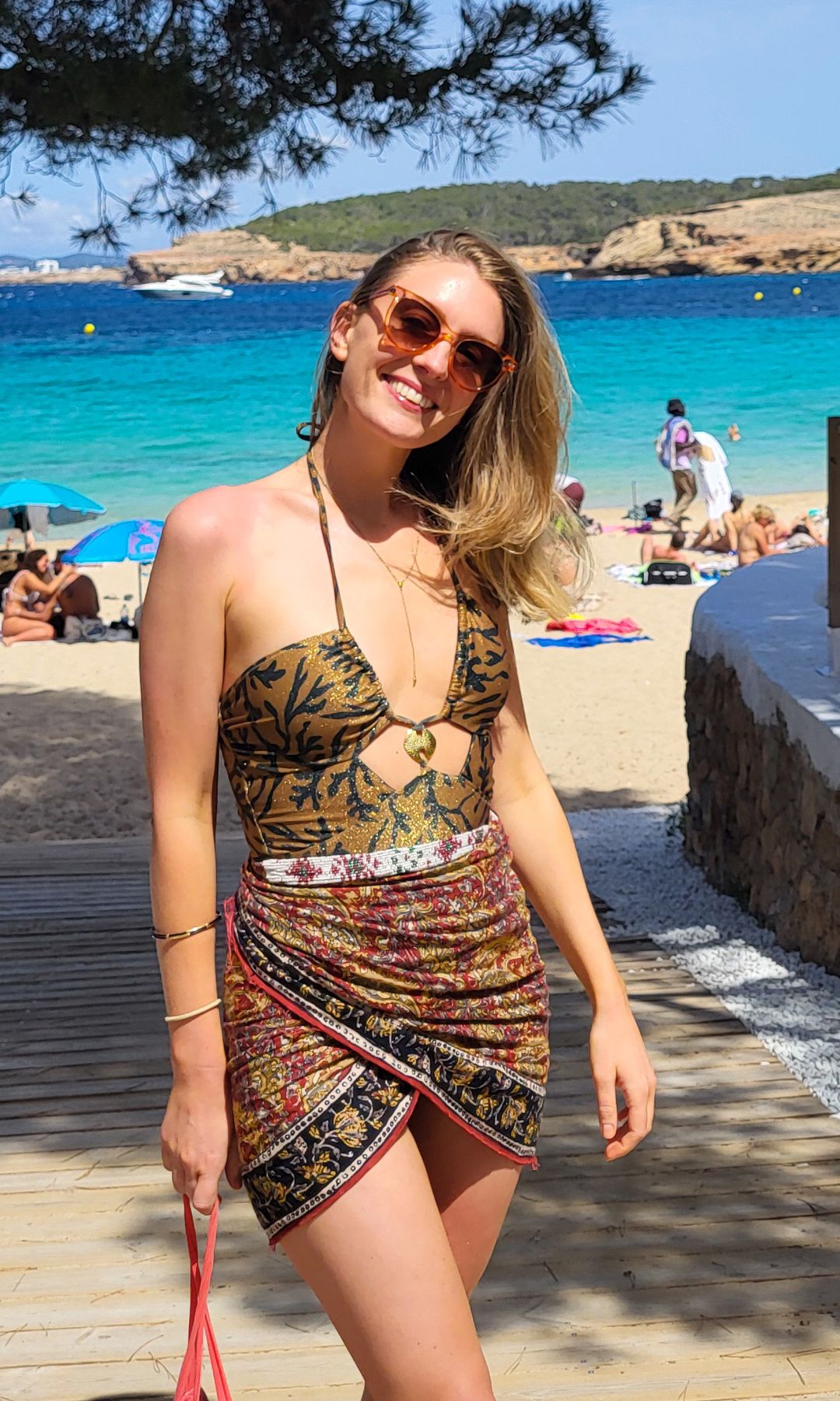 Aliya Wilkinson at the beach in sarong