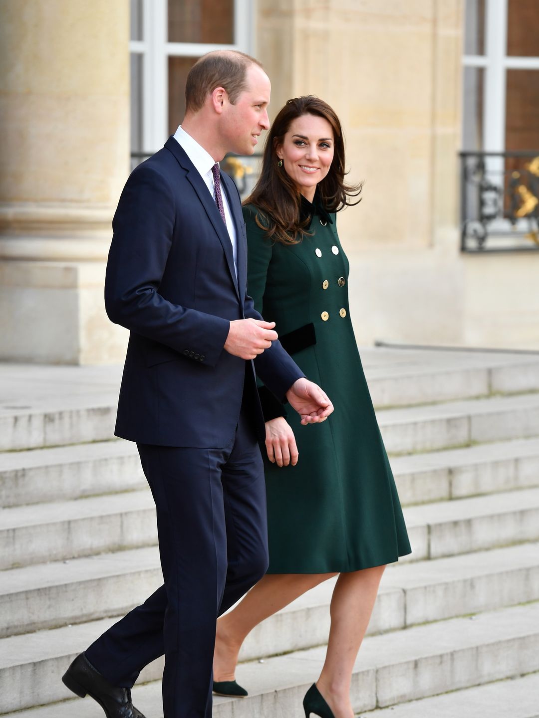 couple walking down steps