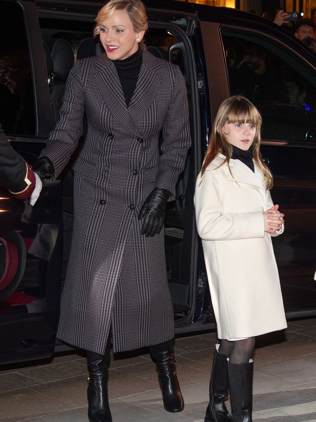 Princess Charlene and her daughter Princess Gabriella in boots