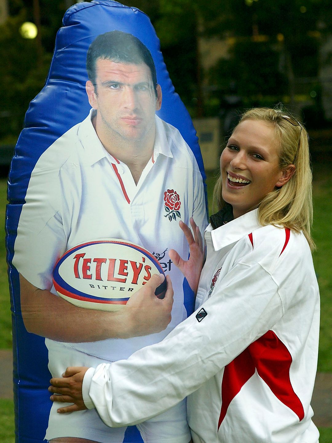Zara Tindall hugging an inflatable rugby player
