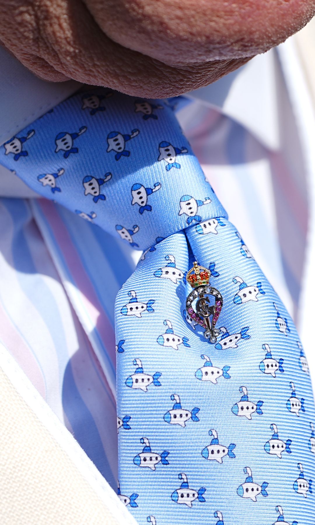A blue tie with submarines on it