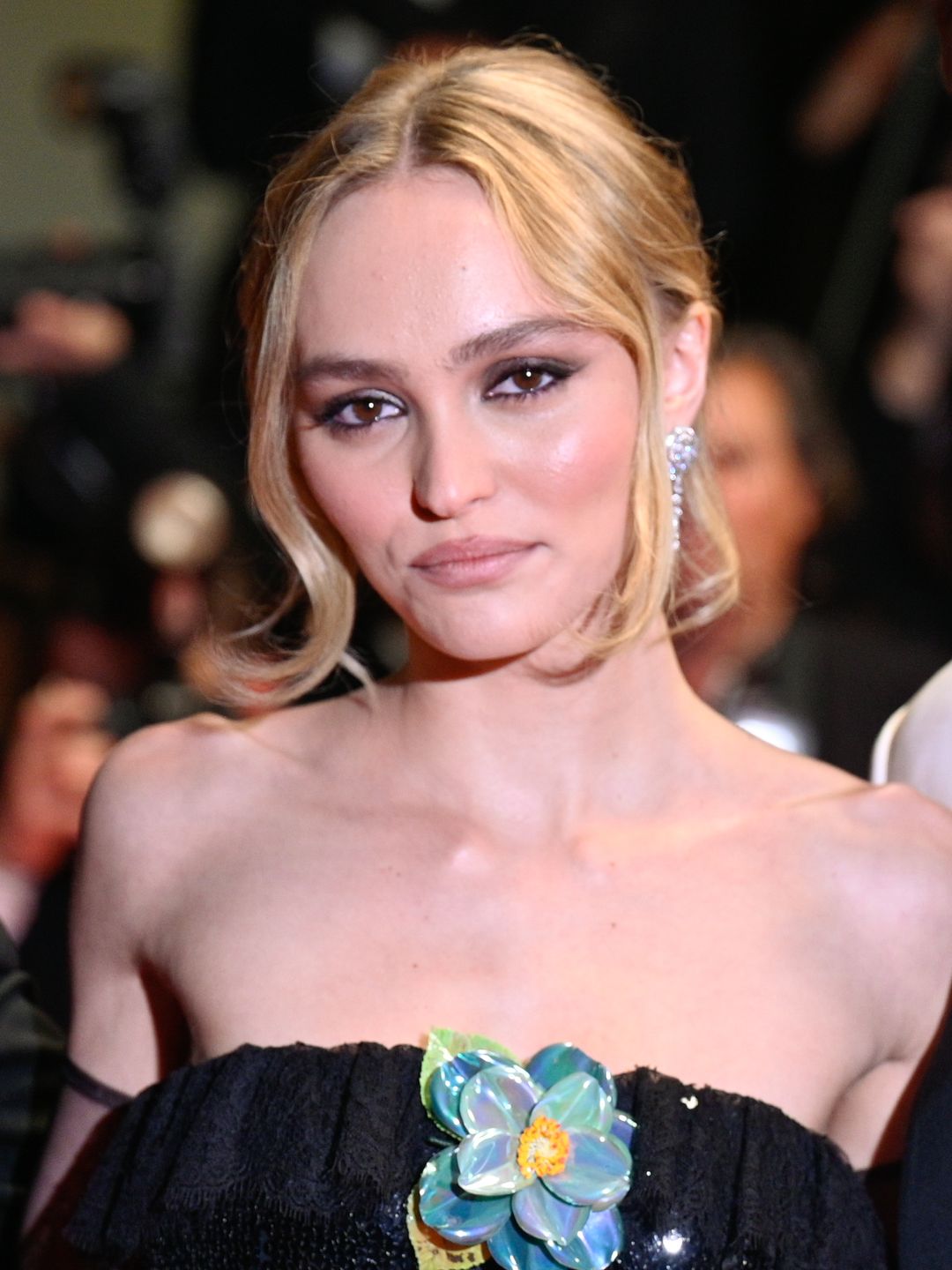 Lily-Rose Depp wore her hair in an unfussy updo for the premiere 