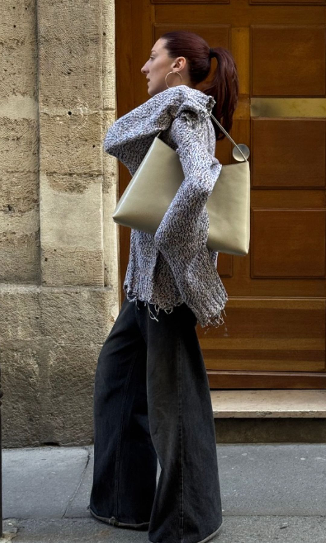verona farrell with big yellow bag