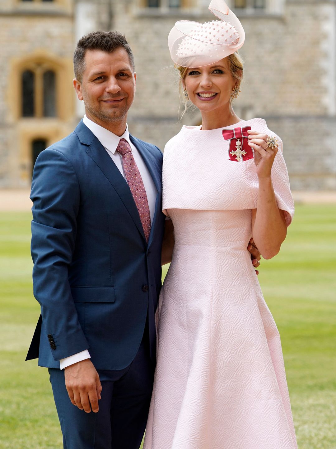 Rachel Riley posed with their medal after being appointed an Officer of the Order of the British Empire (