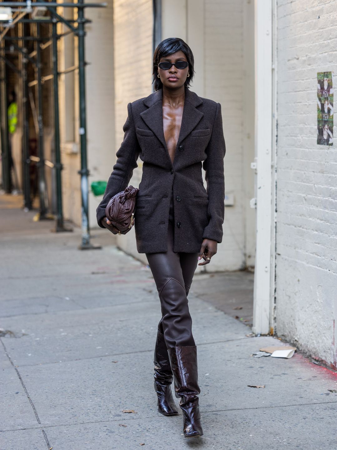 Amy Julliette styles a dark brown blazer with leather trousers 