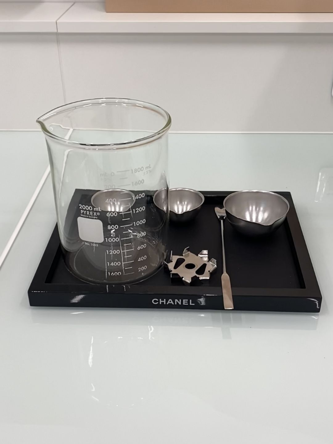 Chanel beaker and lab equipment 