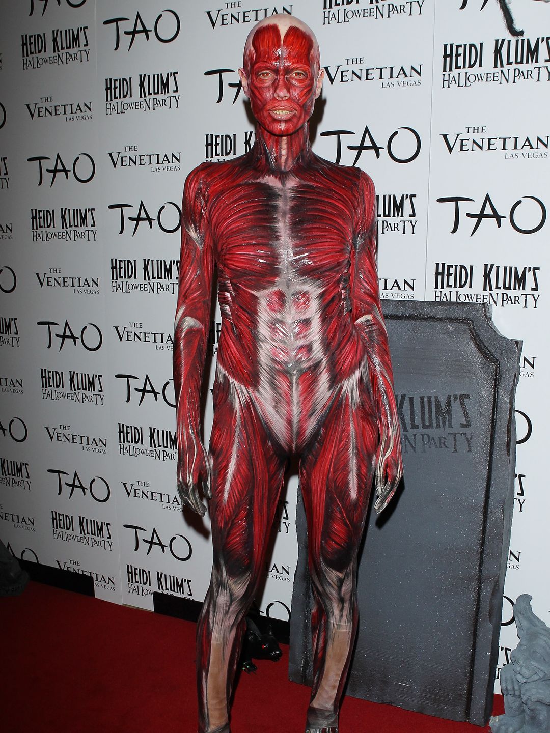 Heidi Klum dresses up as a skinless woman for her 12th annual Halloween party