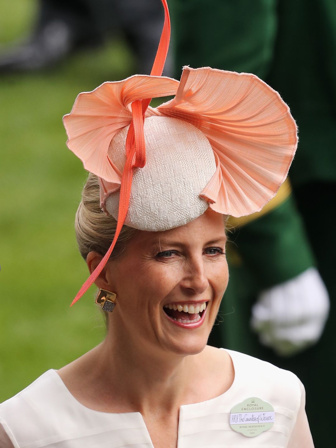 woman wearing peach hat 