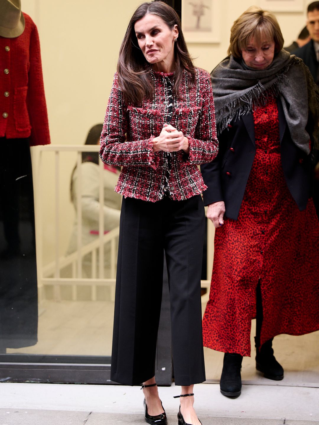 ueen Letizia from Spain visits the central headquarters of the Association for Prevention, Reintegration in a tailor-made jacket with black trousers and ballerinas