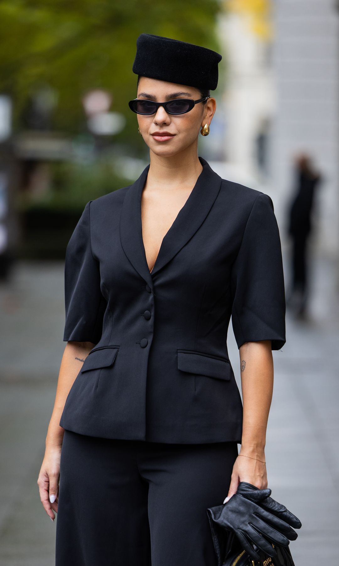 Bella Emar wears black Meshki Blazer & pants