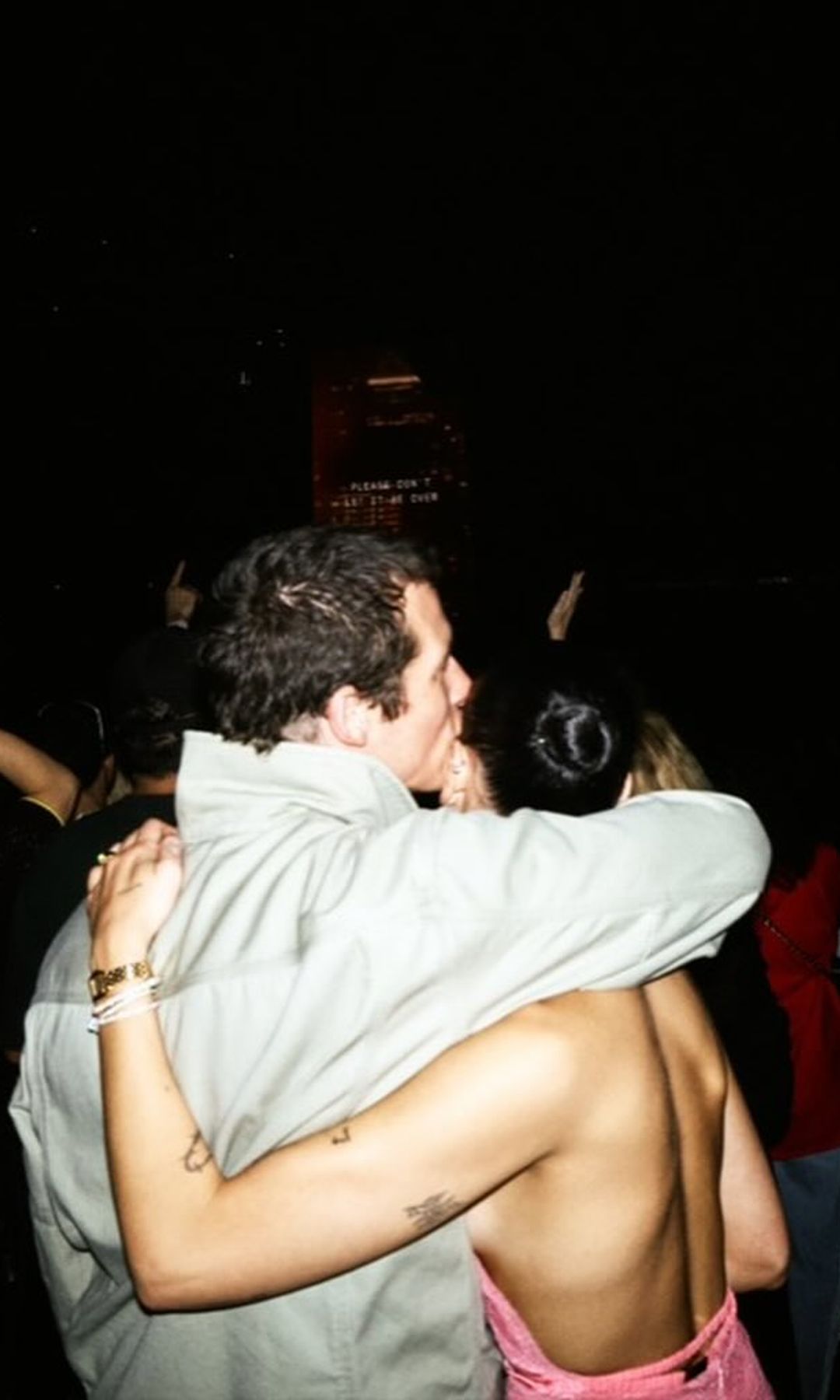 Dua Lipa and Callum Turner share a moment at the Charli XCX concert in NYC