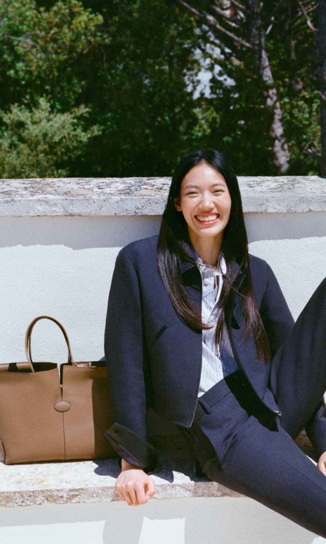 male models and one female model in blue navy suits