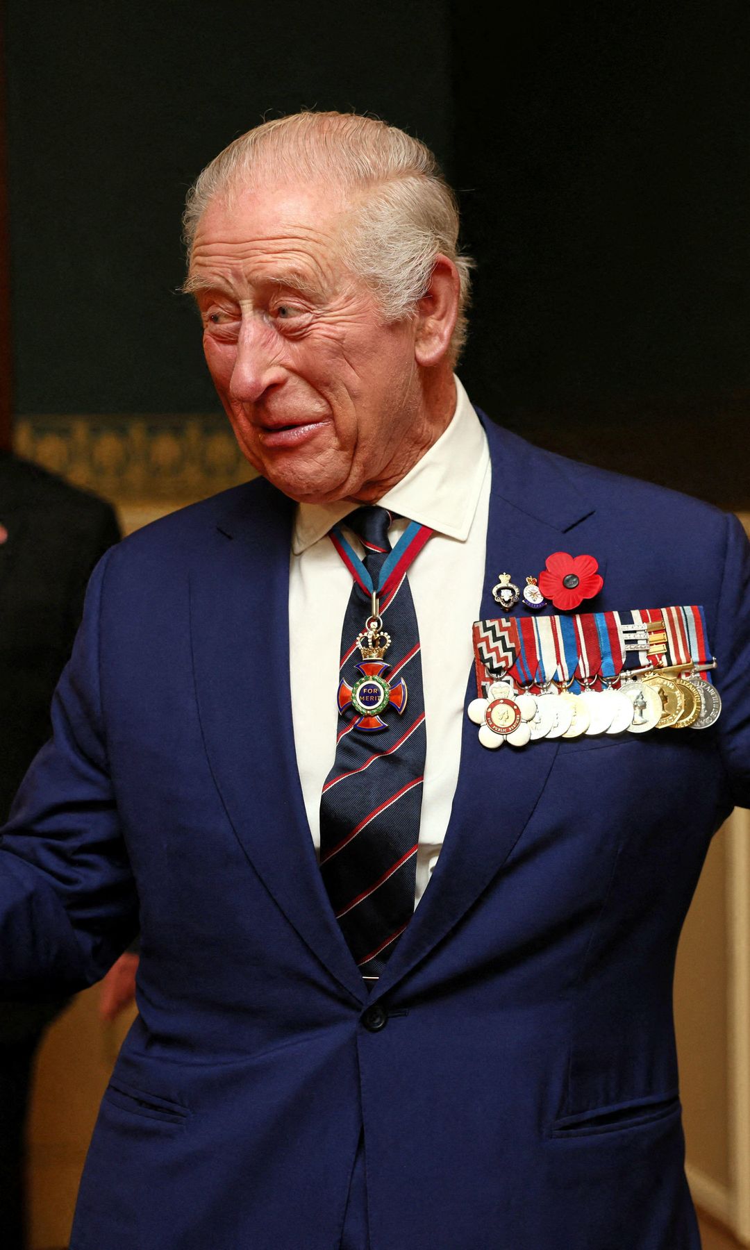 King Charles in a blue suit