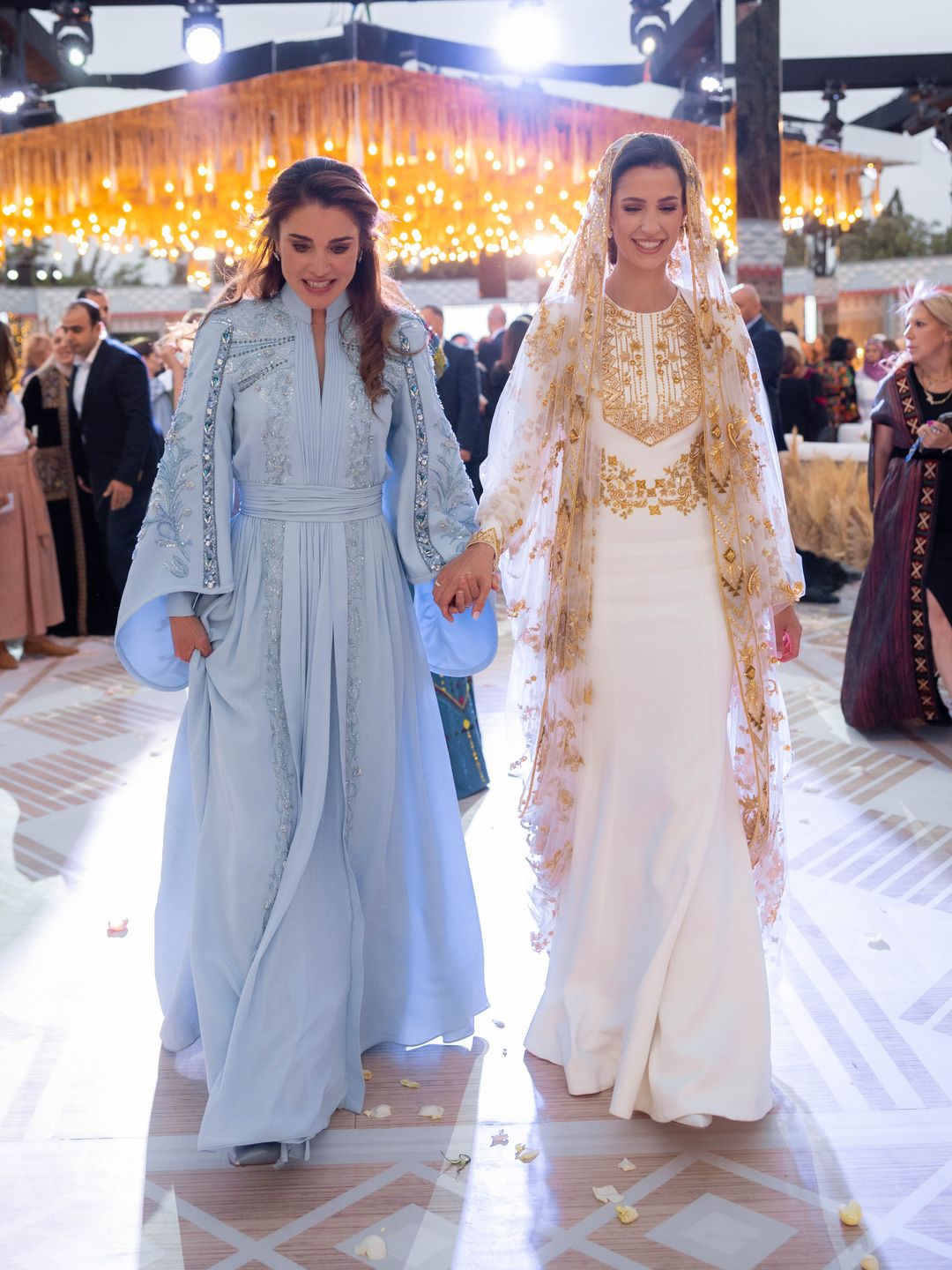 Queen Rania and Rajwa smiling at her henna party