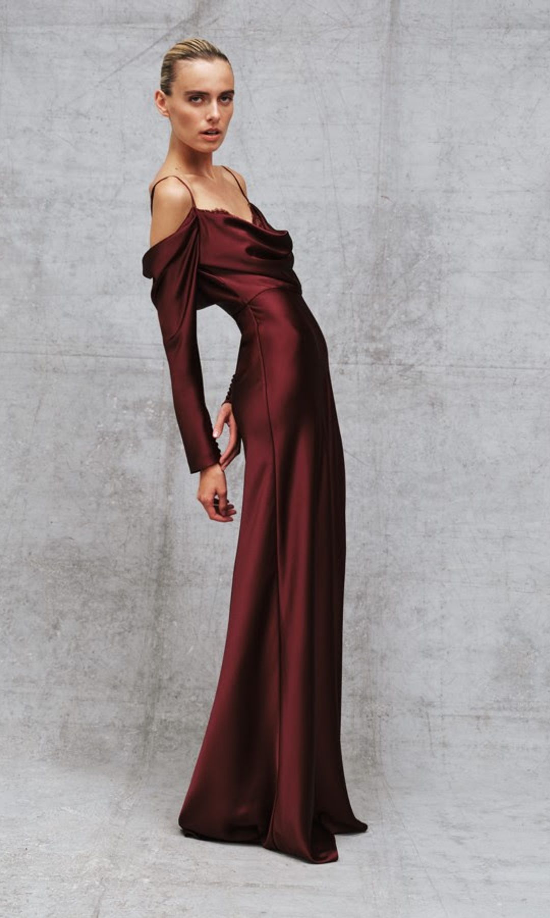 woman in wine red silk gown
