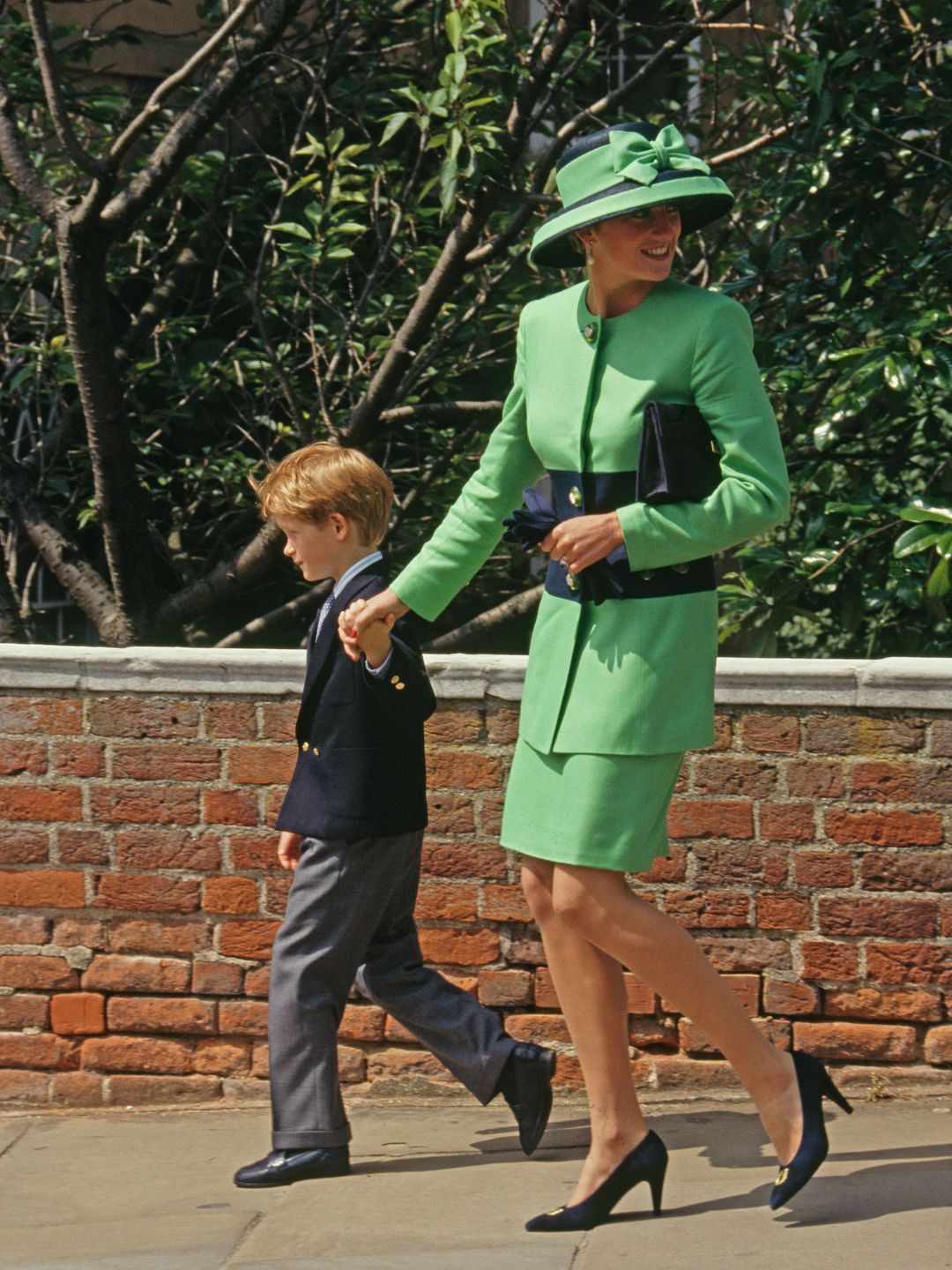 Diana, Princess of Wales  (1961 - 1997) and Prince Harry at the wedding of Lady Helen Windsor and Timothy Taylor at St George's Chapel in Windsor, 18th July 1992