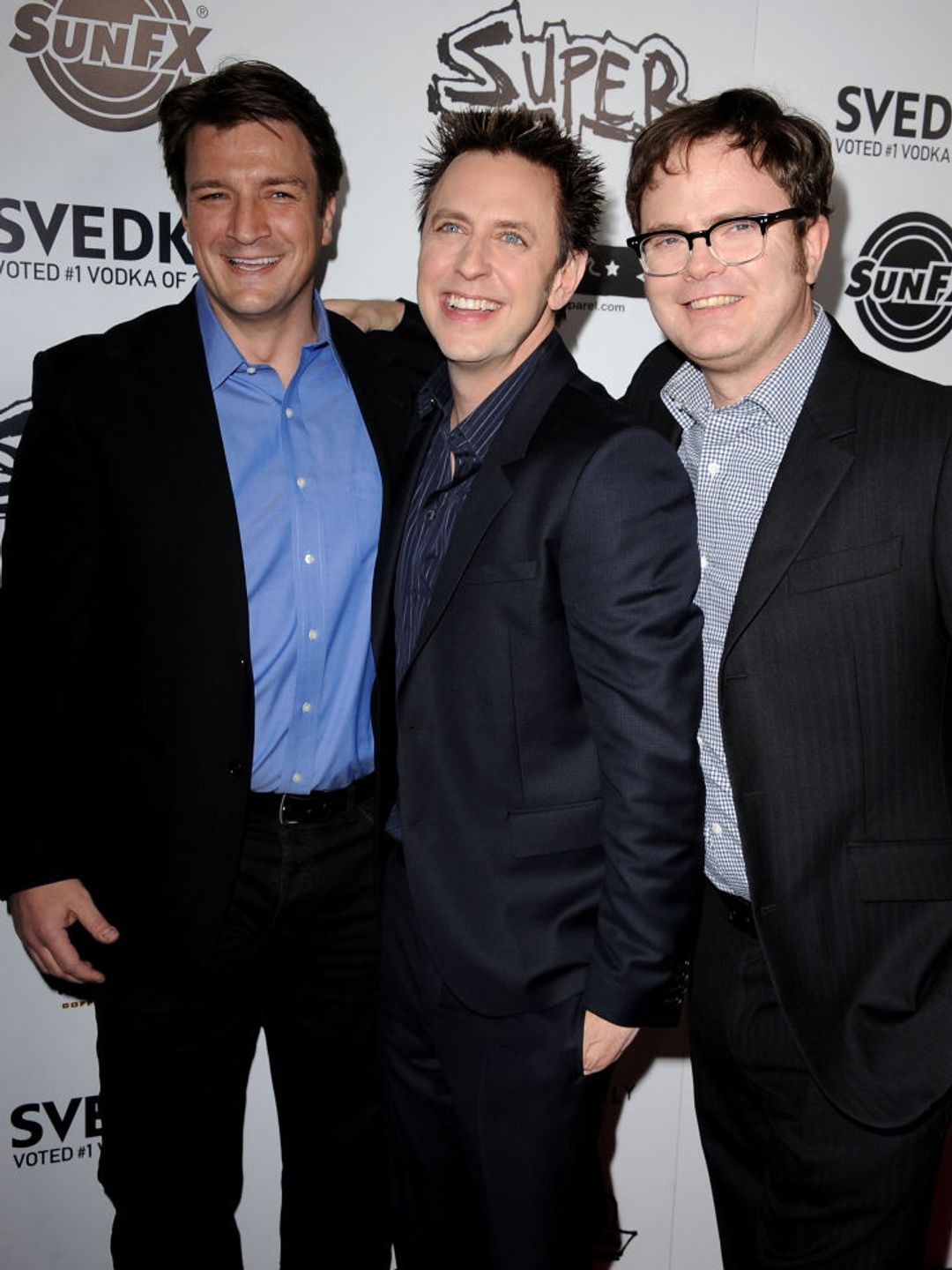 Actor Nathan Fillion, Writer/director James Gunn and actor Rainn Wilson arrive at the Los Angeles premiere of Super