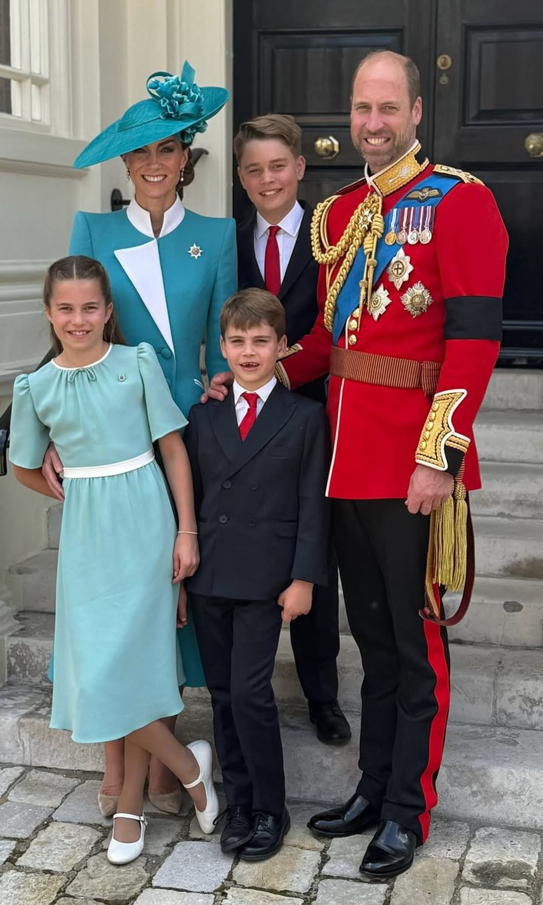 The Prince and Princess of Wales with their three kids following Trooping the Colour