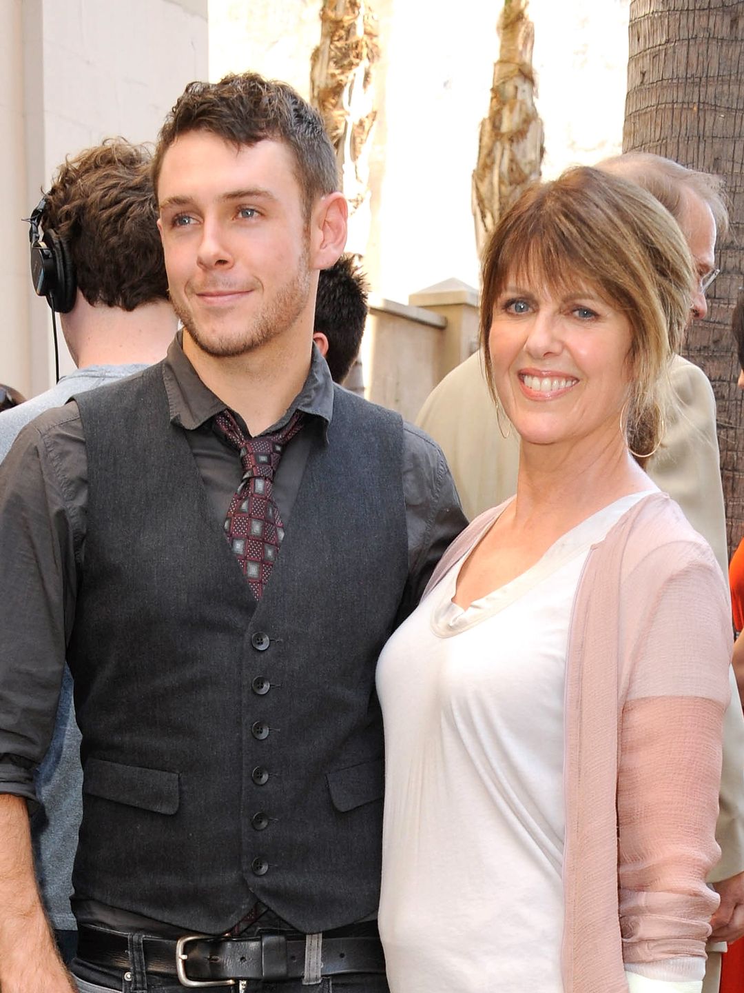 Pam Dawber and son Sean Harmon participate in the  Mark Harmon star ceremony on the Hollywood Walk of Fame on October 1, 2012 in Hollywood, California