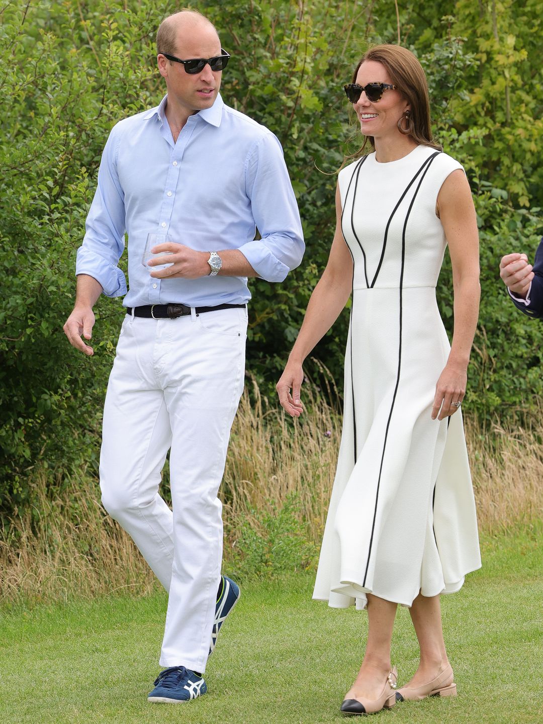 WINDSOR, ENGLAND - JULY 06: Prince William, Duke of Cambridge and Catherine, Duchess of Cambridge arrive for the Royal Charity Polo Cup 2022 at Guards Polo Club  during the Outsourcing Inc. Royal Polo Cup at Guards Polo Club, Flemish Farm on July 06, 2022 in Windsor, England. (Photo by Chris Jackson/Getty Images for TLA Worldwide)