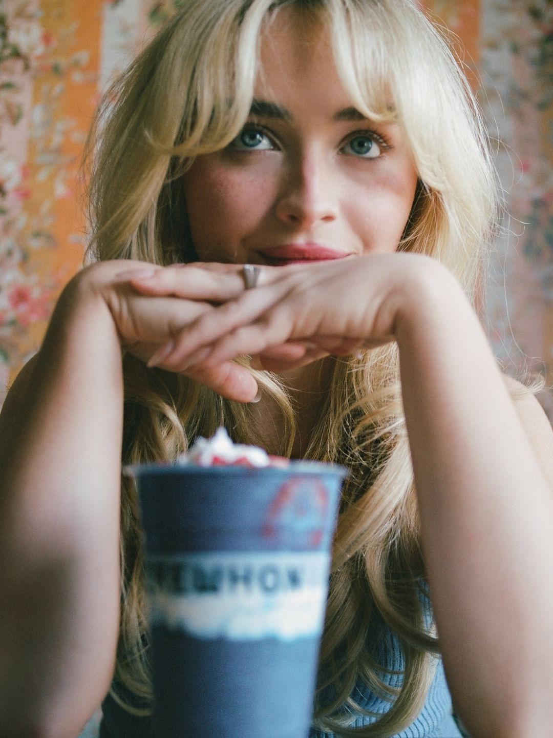 Sabrina Carpenter poses with her blue Erewhon smoothie