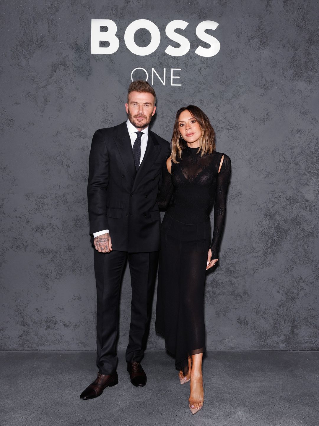 David supported by Victoria Beckham at BOSS One launch 